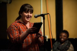 Emily Carroll reads at the Boston Poetry Slam at the Cantab Lounge. Photo by Marshall Goff.