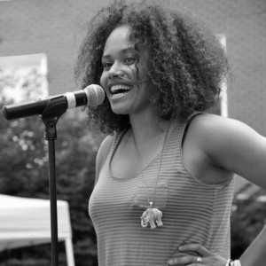 Jha D Williams, founder of If You Can Feel It, You Can Speak It, performing at the Philly Dyke March.